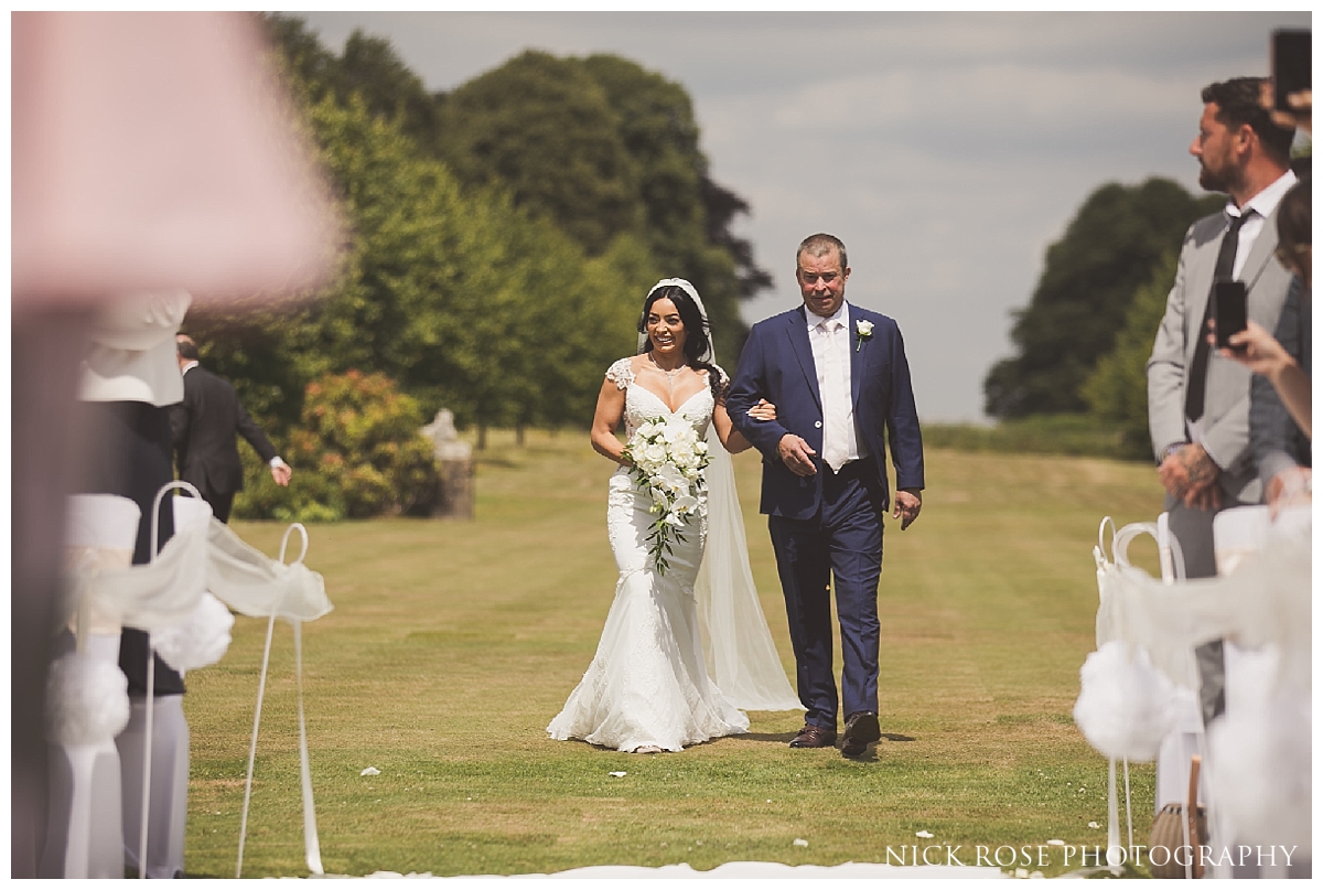 Outdoor wedding ceremony at Buxted Park in East Sussex