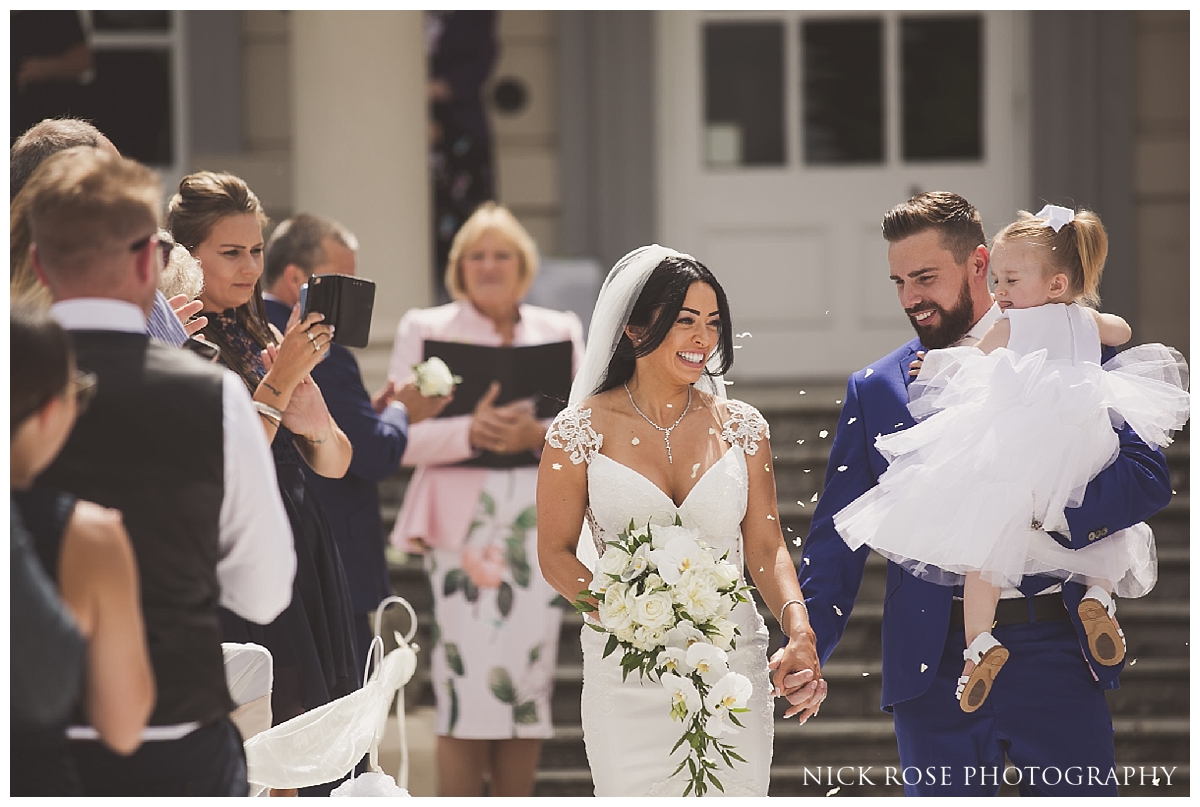  Outside wedding ceremony at Buxted Park in East Sussex 