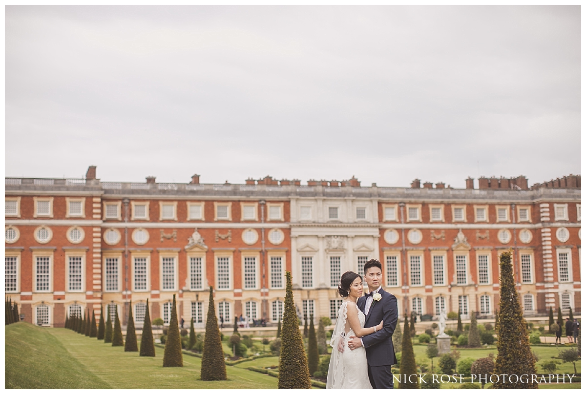  Bride and groom wedding photography portrait in the gardens at Hampton Court Palace 