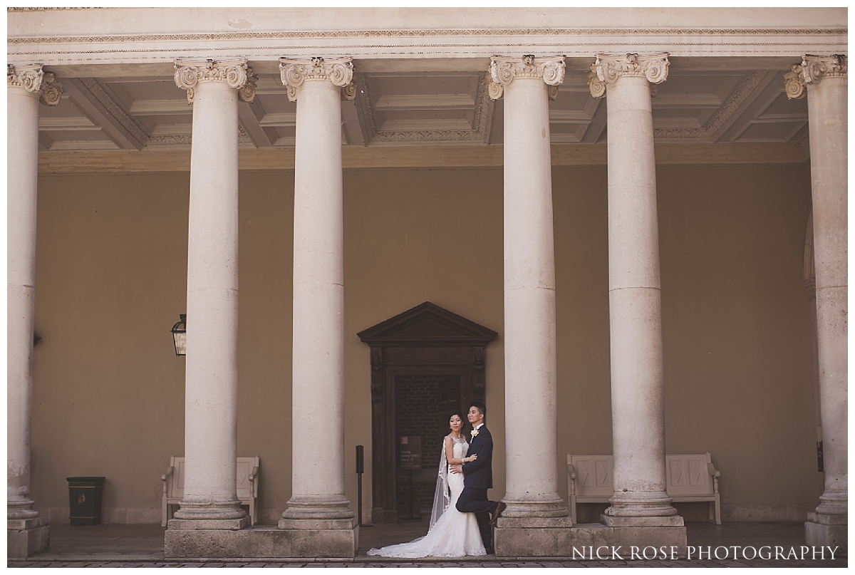  Bride and groom wedding photography portrait in the courtyard at Hampton Court Palace 