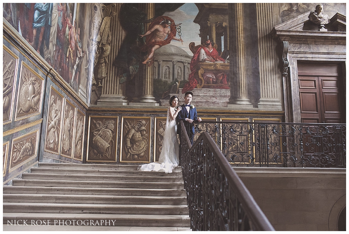  Bride and groom wedding photography portrait on the Kings staircase at Hampton Court Palace 