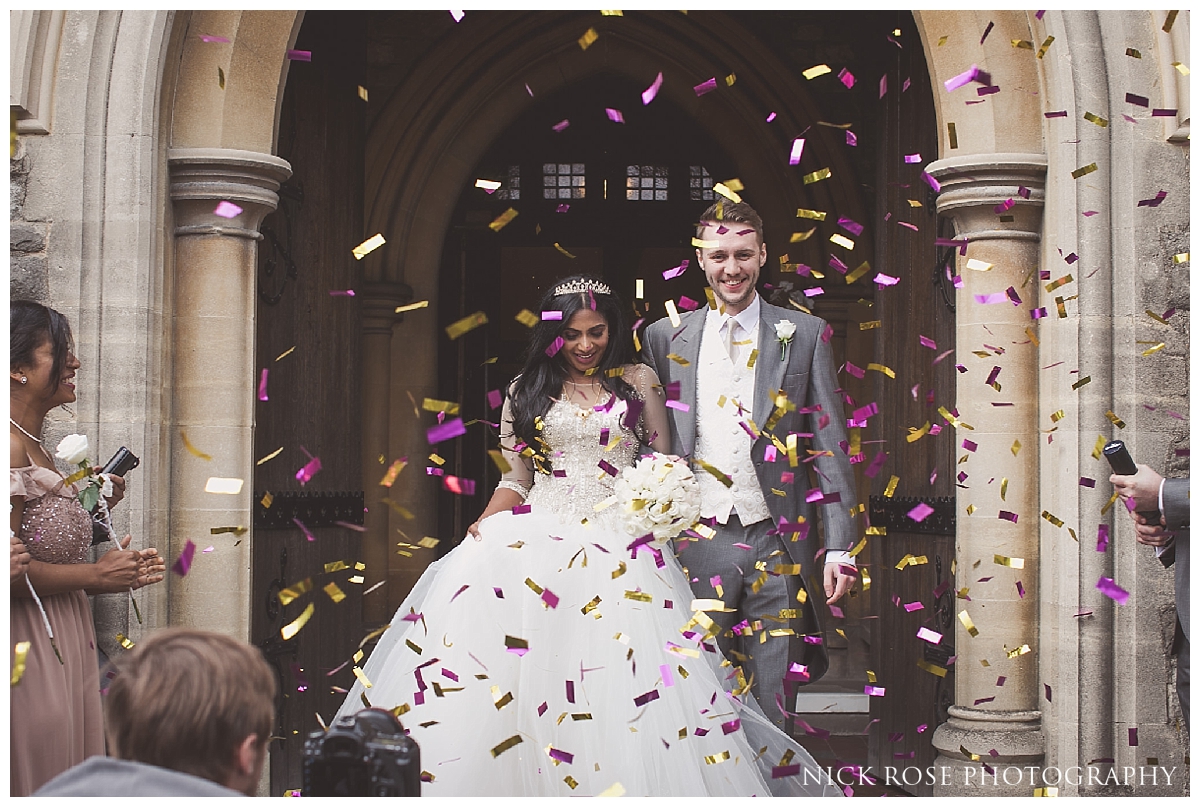  Bride and groom wedding photography portraits after a Catholic wedding ceremony at St Mary Magdalene Church in Enfield London 