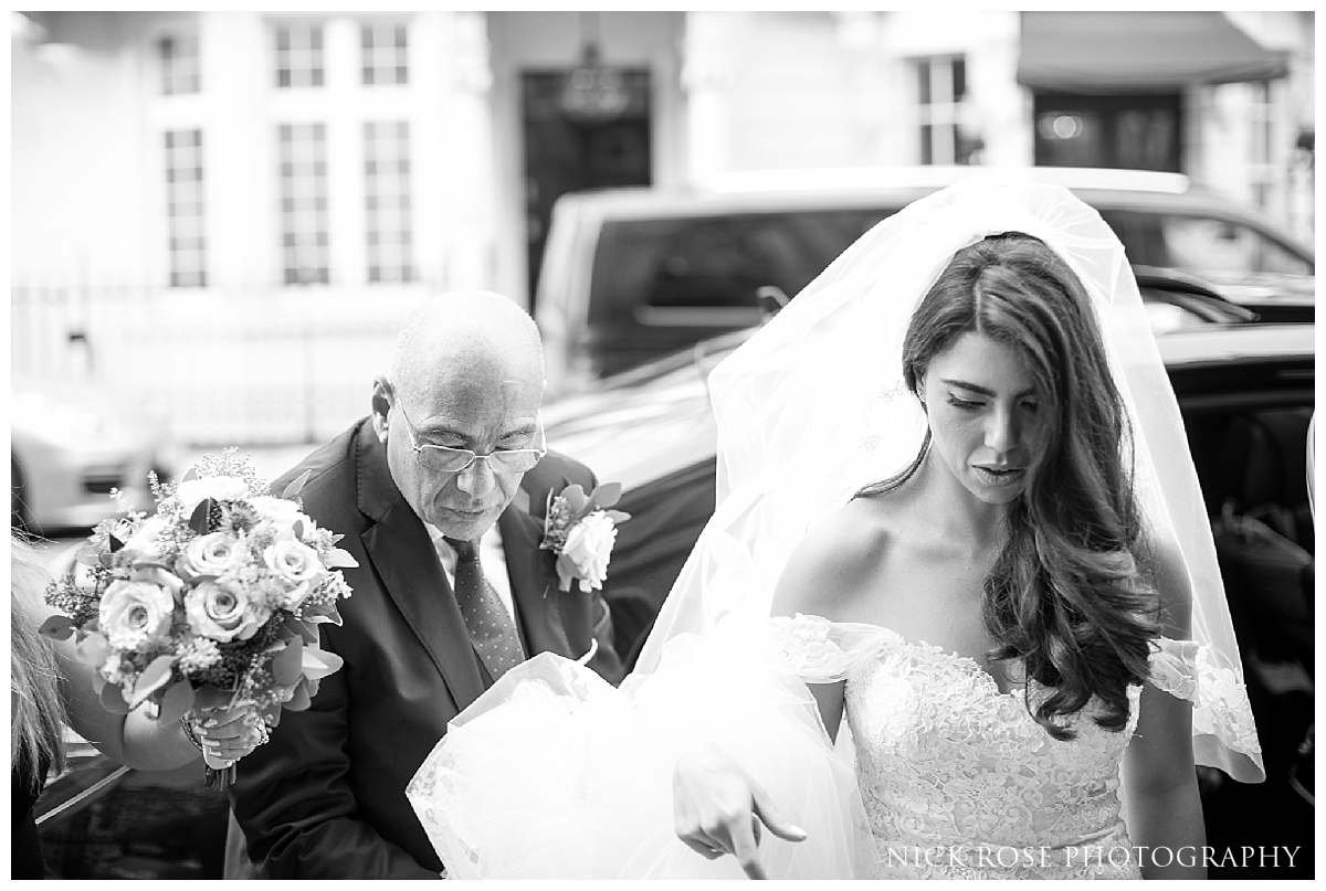  Bride walking up the steps to Dartmouth House in London 
