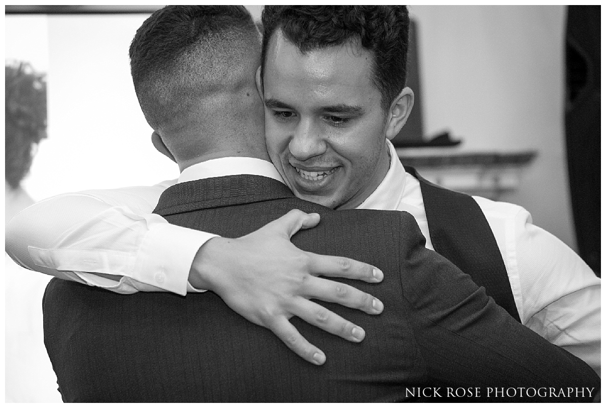 Groom and best man during a wedding reception at Dartmouth House