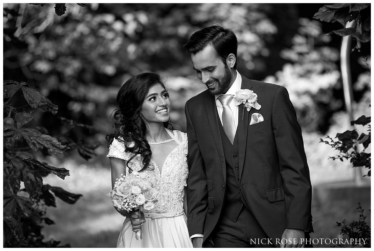 Bride and groom outdoor wedding photography in the gardens at Waddesdon Manor in Buckinghamshire