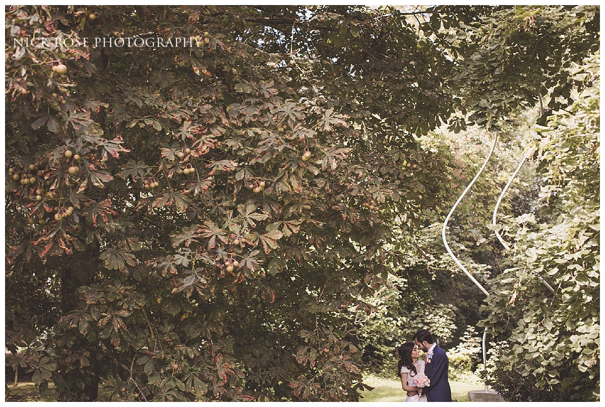 Summer wedding photography in the gardens at Waddesdon Manor in Buckinghamshire