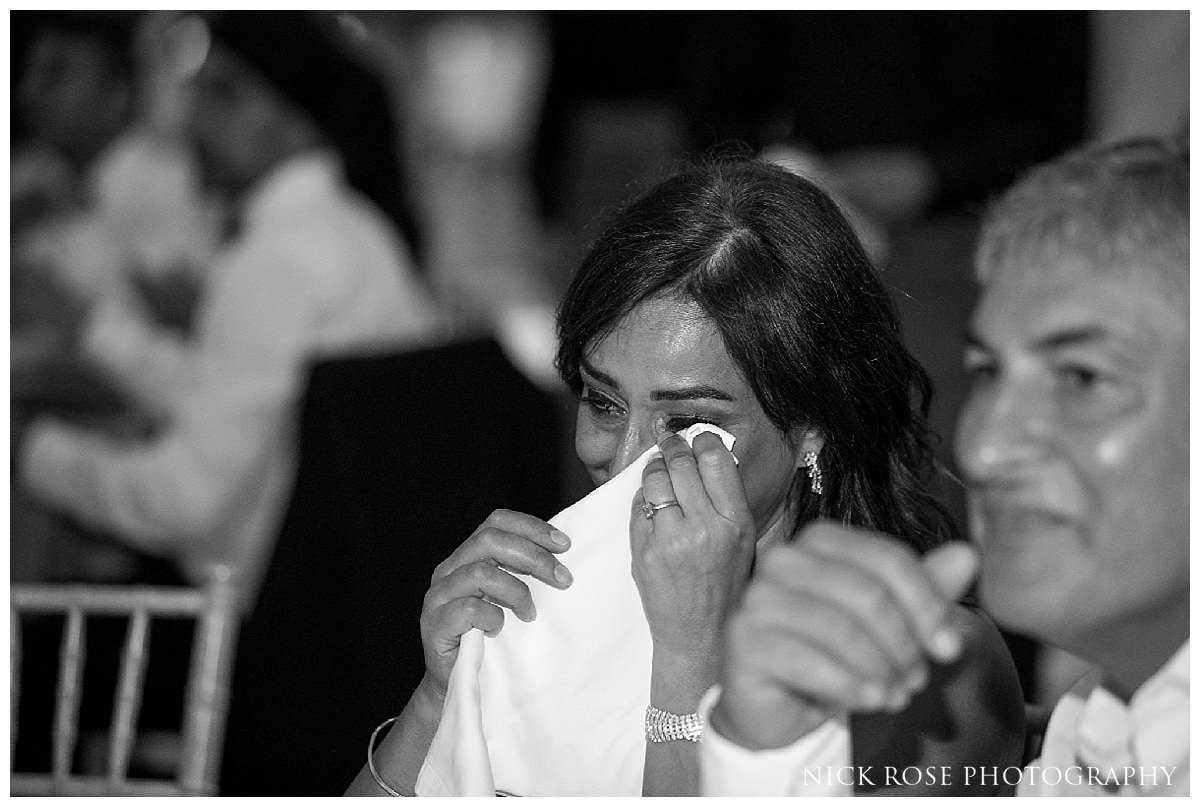 Mother crying during a destination wedding reception in Spain at The Hemisferic&nbsp; 