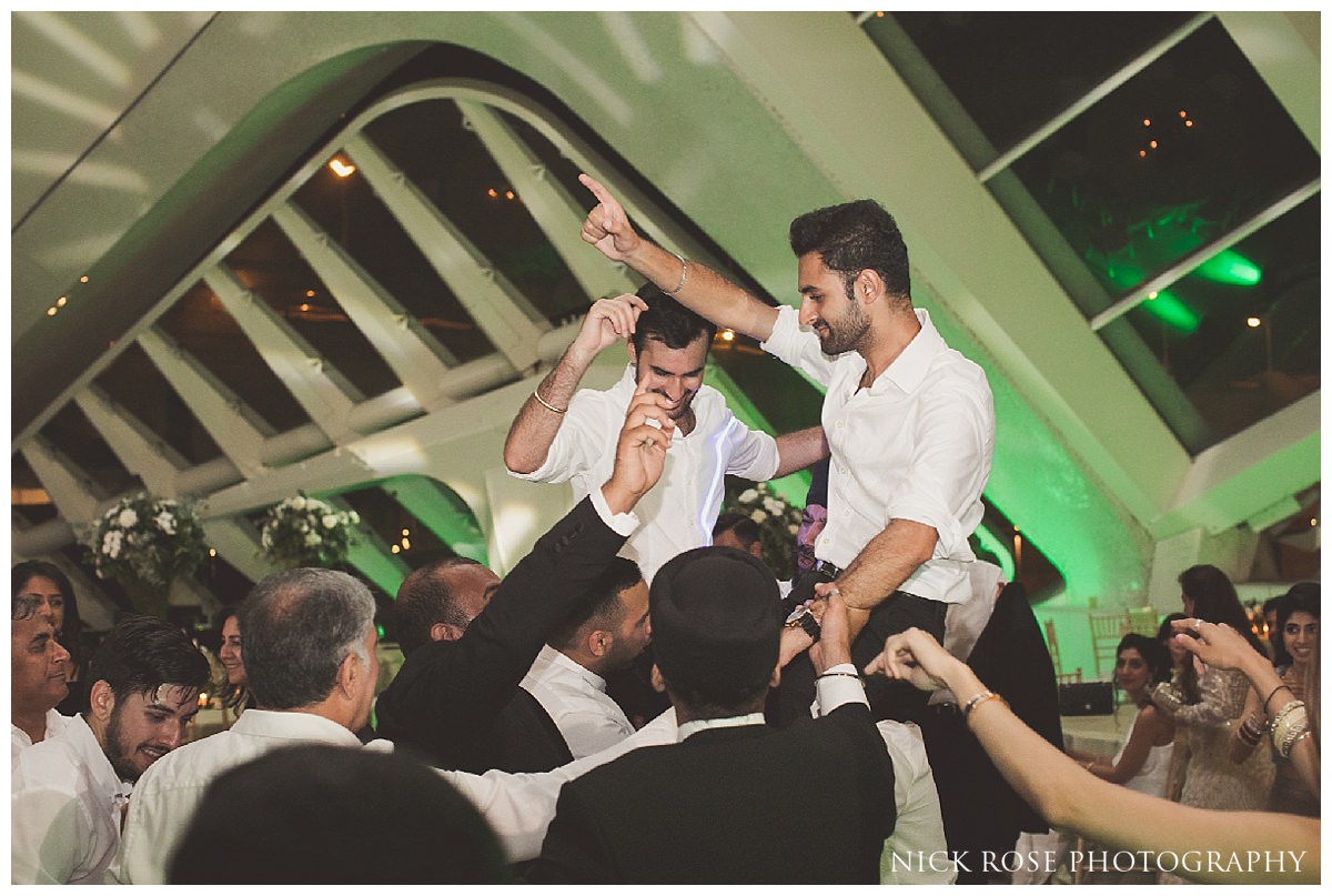  Ushers dancing on shoulders during a Sikh wedding in Valencia Spain 
