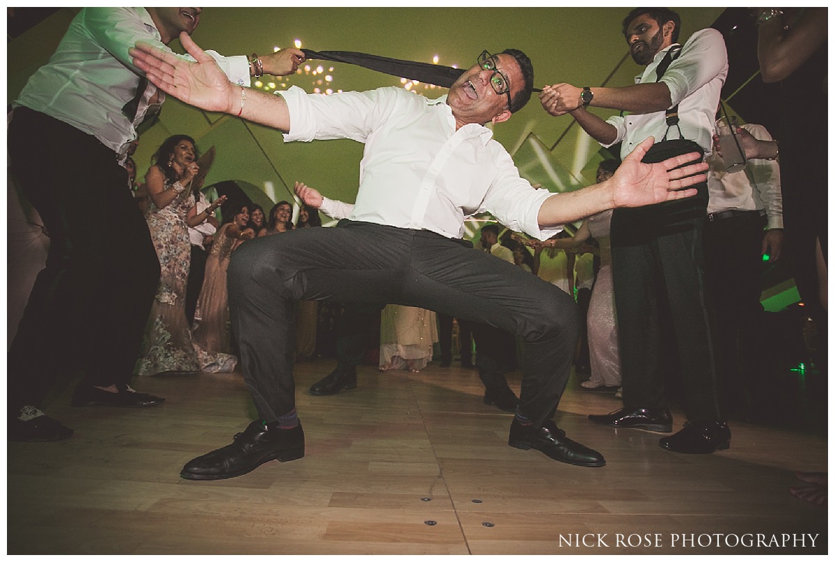  Limbo dancing competition during a fun destination wedding at The Hemisferic in Valencia Spain 