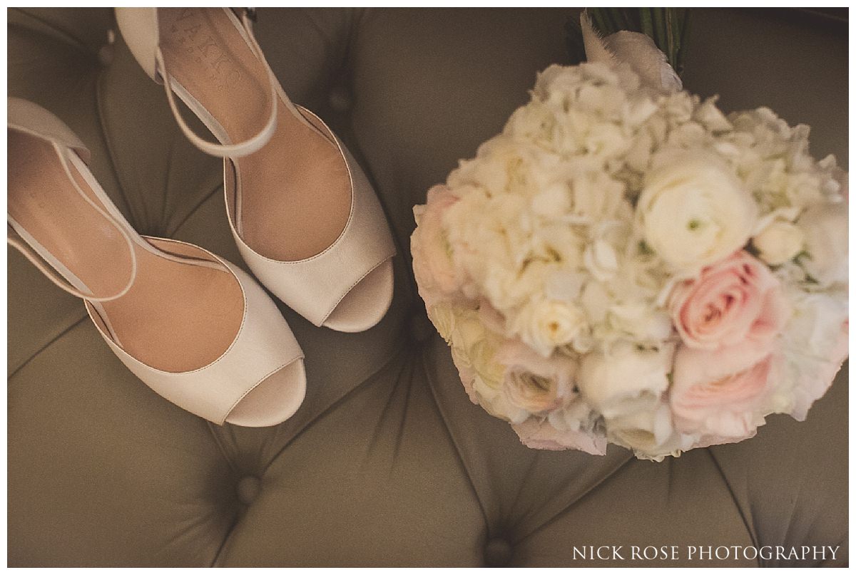  Brides shoes and bouquet for a London wedding at The Savoy Hotel 