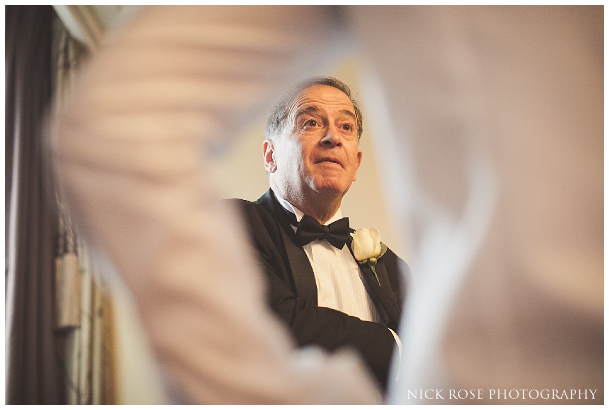 Grooms father preparing for a wedding at The Savoy