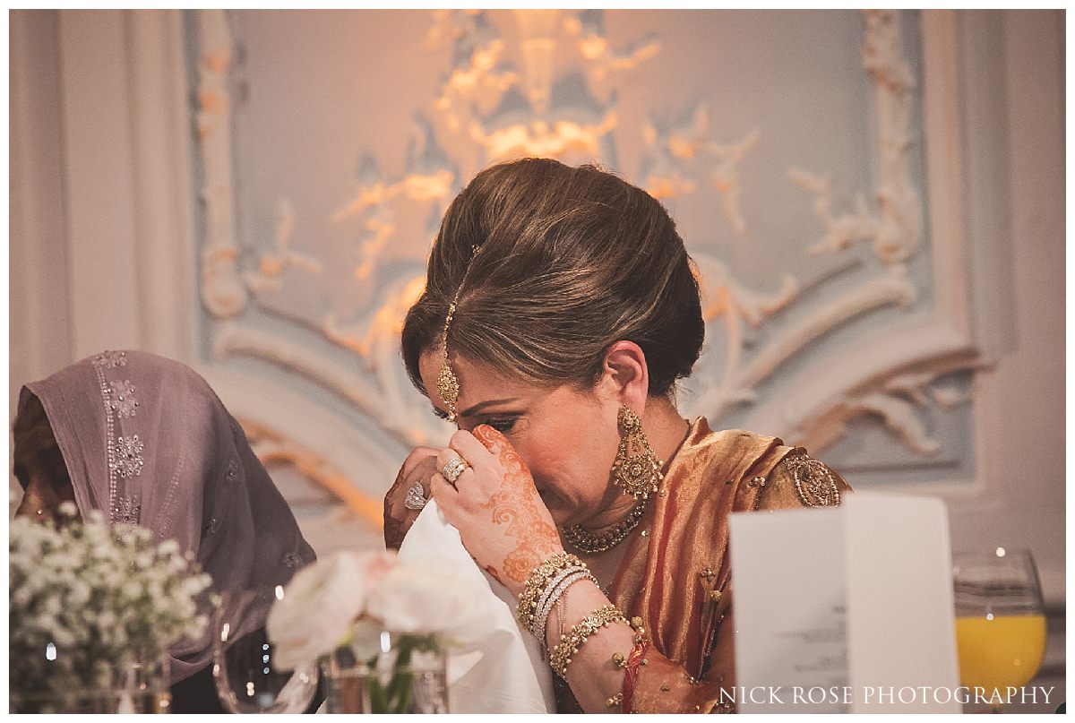  Mother crying during the speeches at a Savoy London wedding 