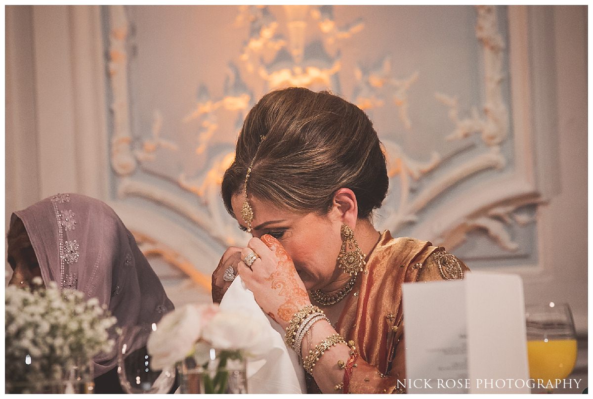 Mother crying during the speeches at a Savoy London wedding
