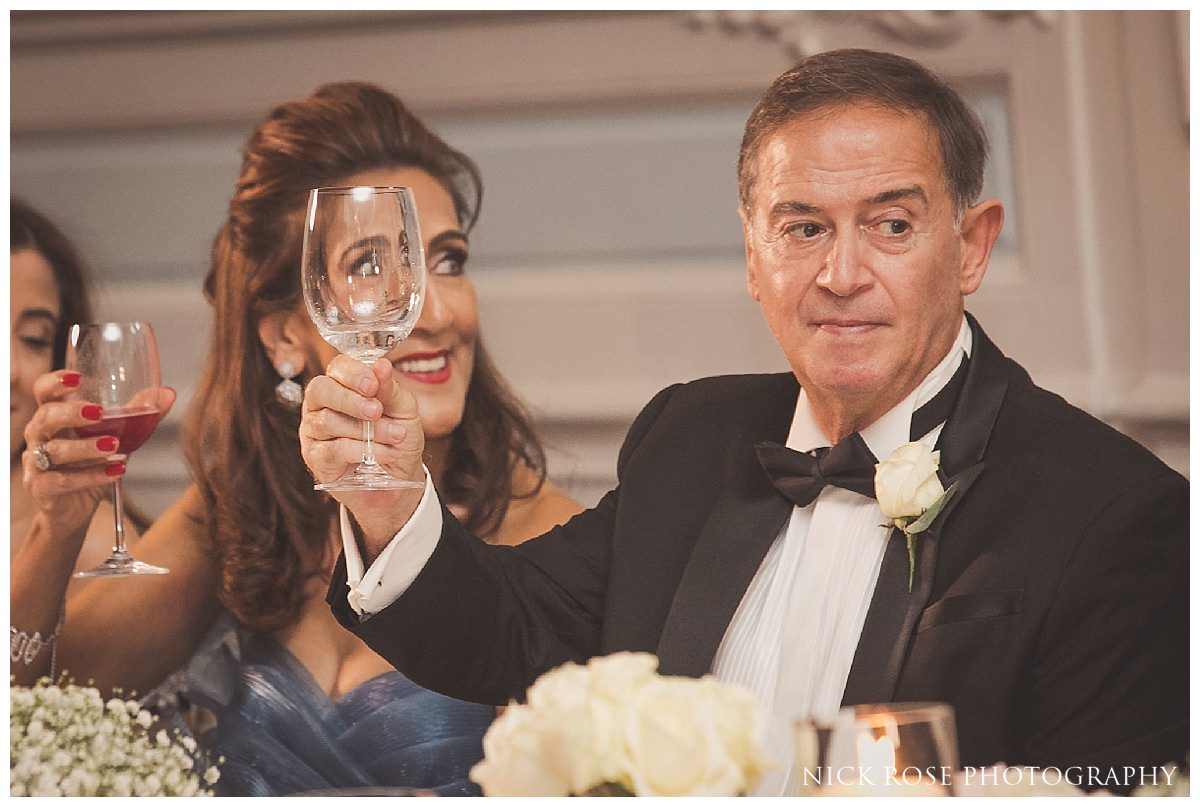 Mother crying during the speeches at a Savoy London wedding