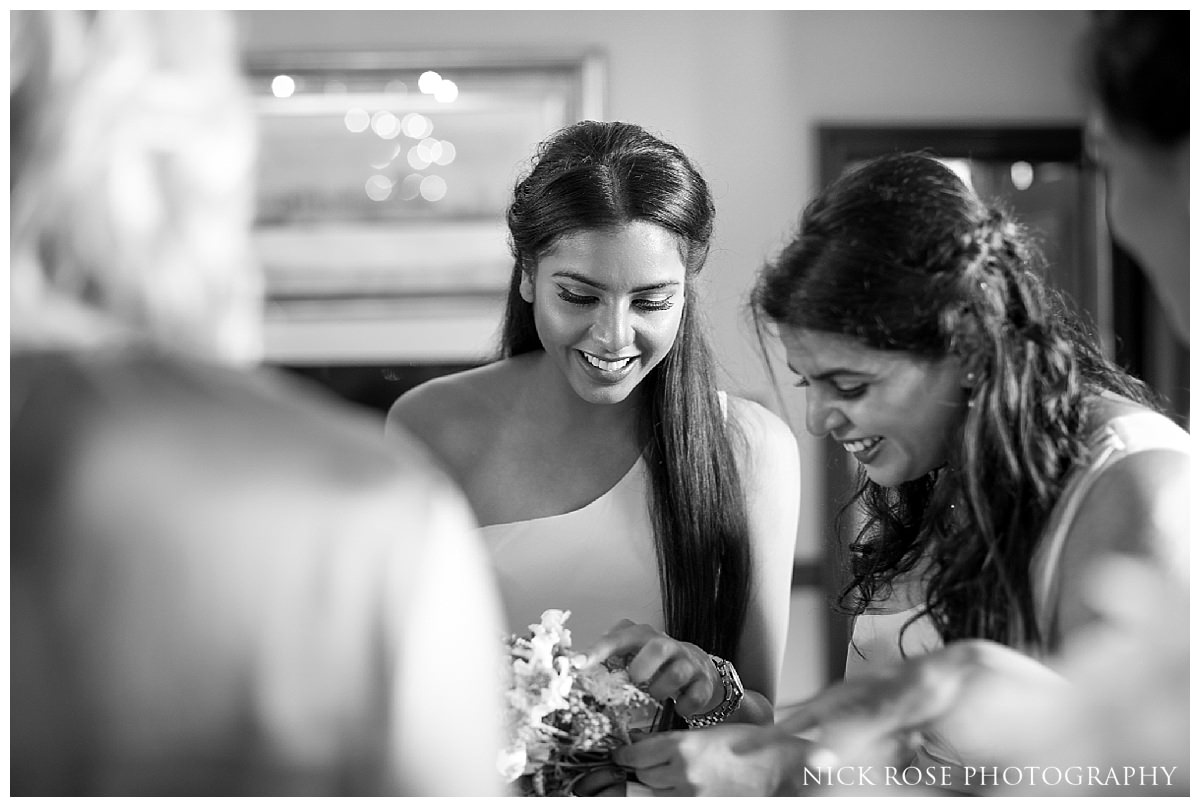  Bridesmaids getting ready for her Indian civil wedding ceremony at Stoke Park in Buckinghamshire 