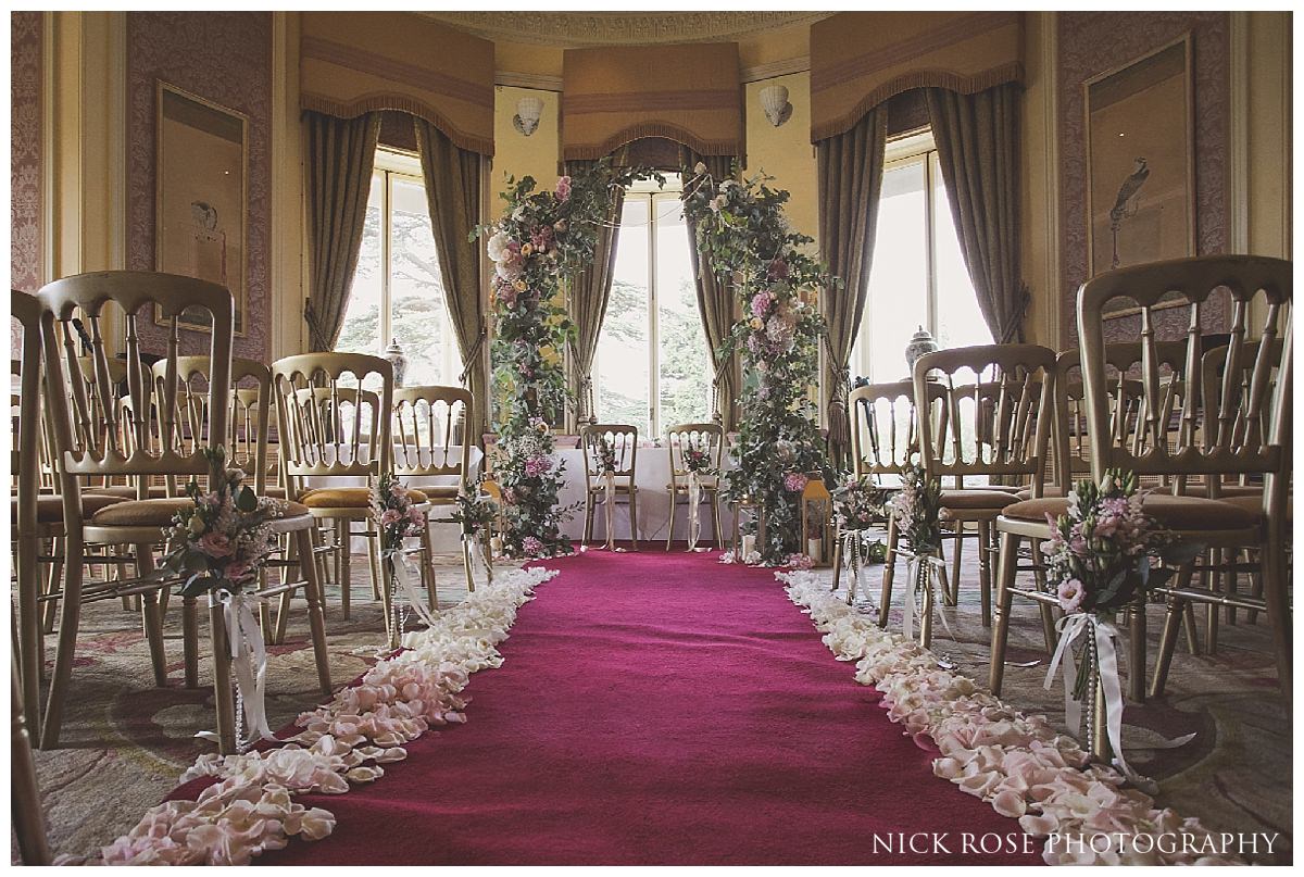  Indoor civil wedding ceremony setup at Stoke Park in Buckinghamshire 