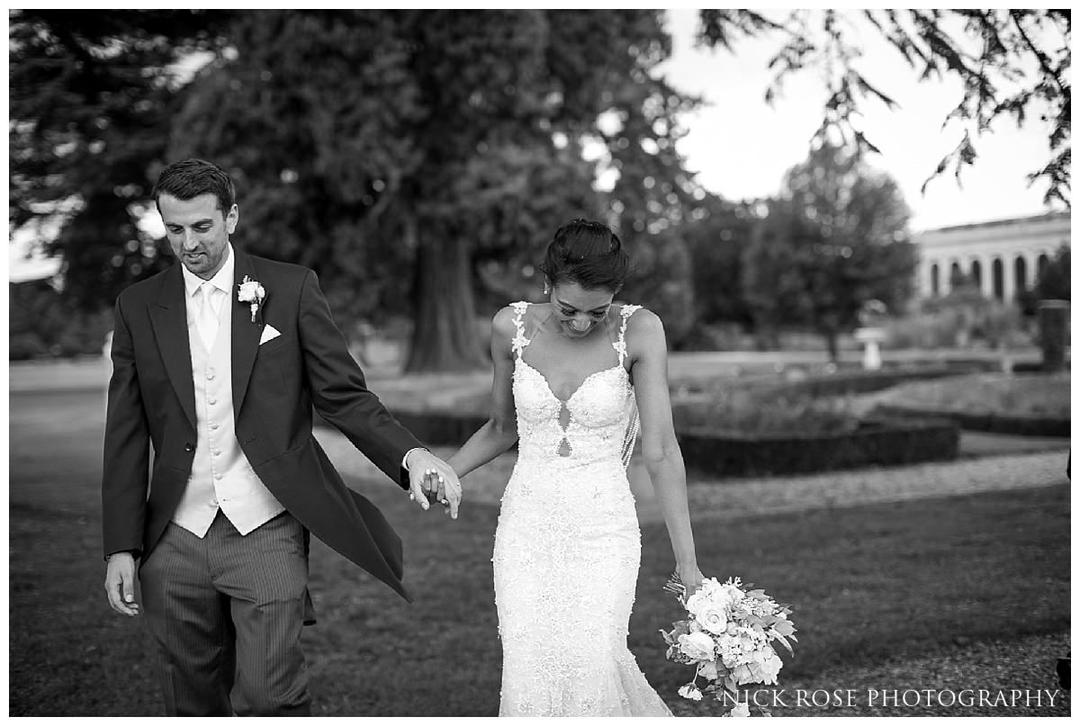  Bride and groom wedding photographs at Stoke Park Hotel in Buckinghamshire 