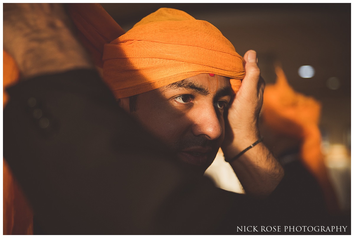 Groom preparations at the Oshwal Centre for a Hindu wedding in Hertfordshire