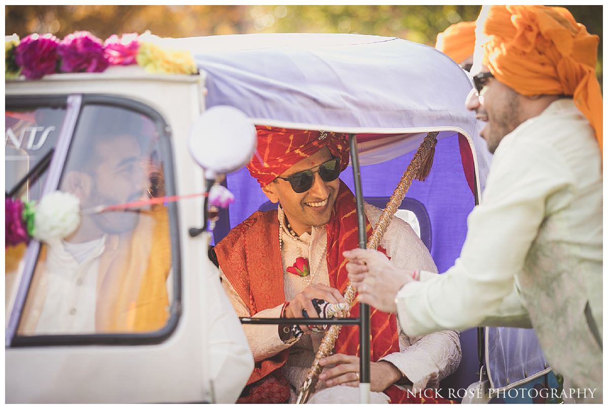  Hindu wedding baraat on an Indian rickshaw at the Potters Bar Oshwal Centre in Hertfordshire 
