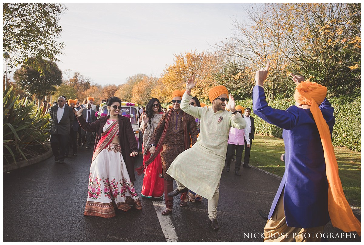 Hindu wedding baraat on an Indian rickshaw at the Potters Bar Oshwal Centre in Hertfordshire
