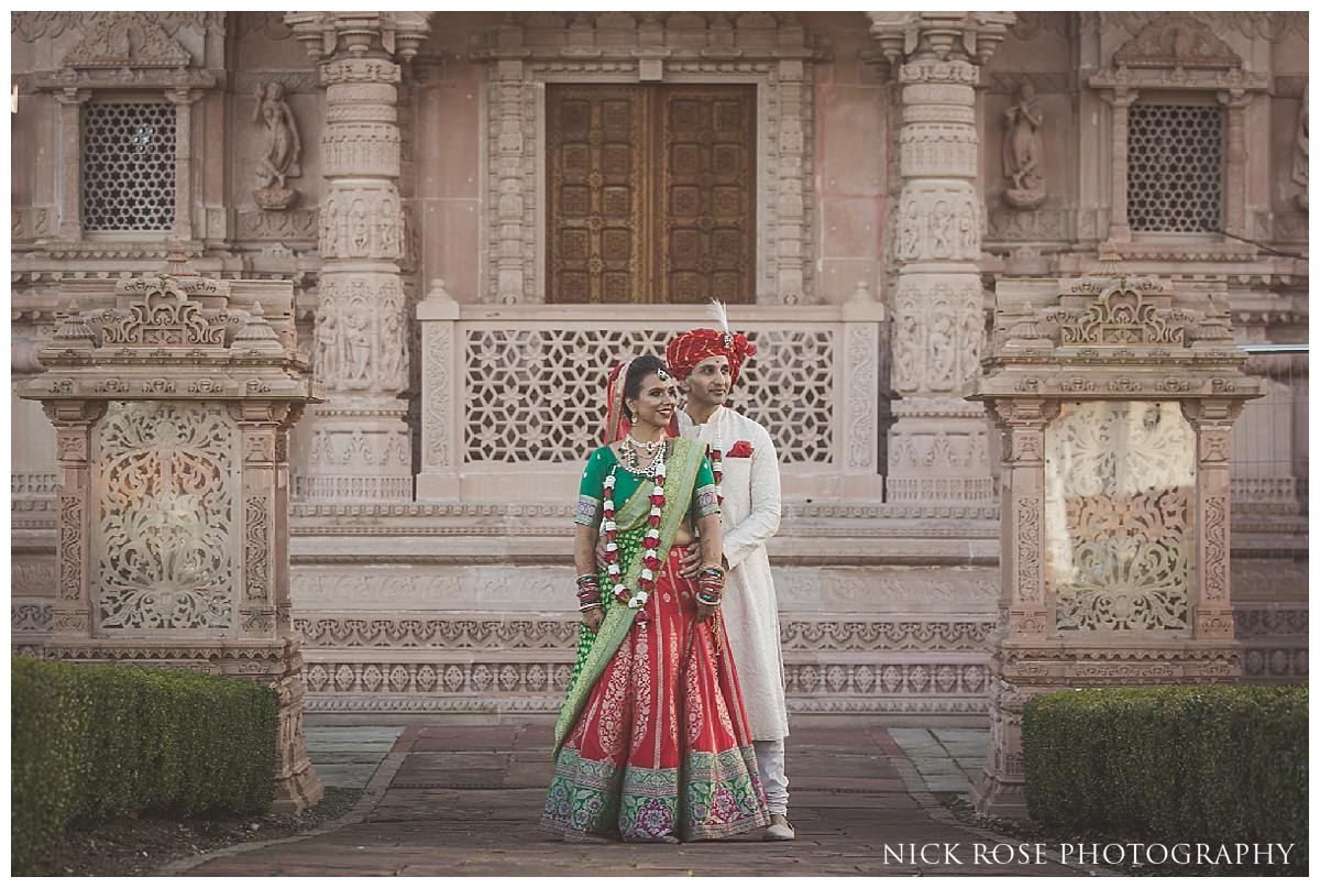 Indian bride and groom wedding photography portrait at the Oshwal Centre in Potters Bar