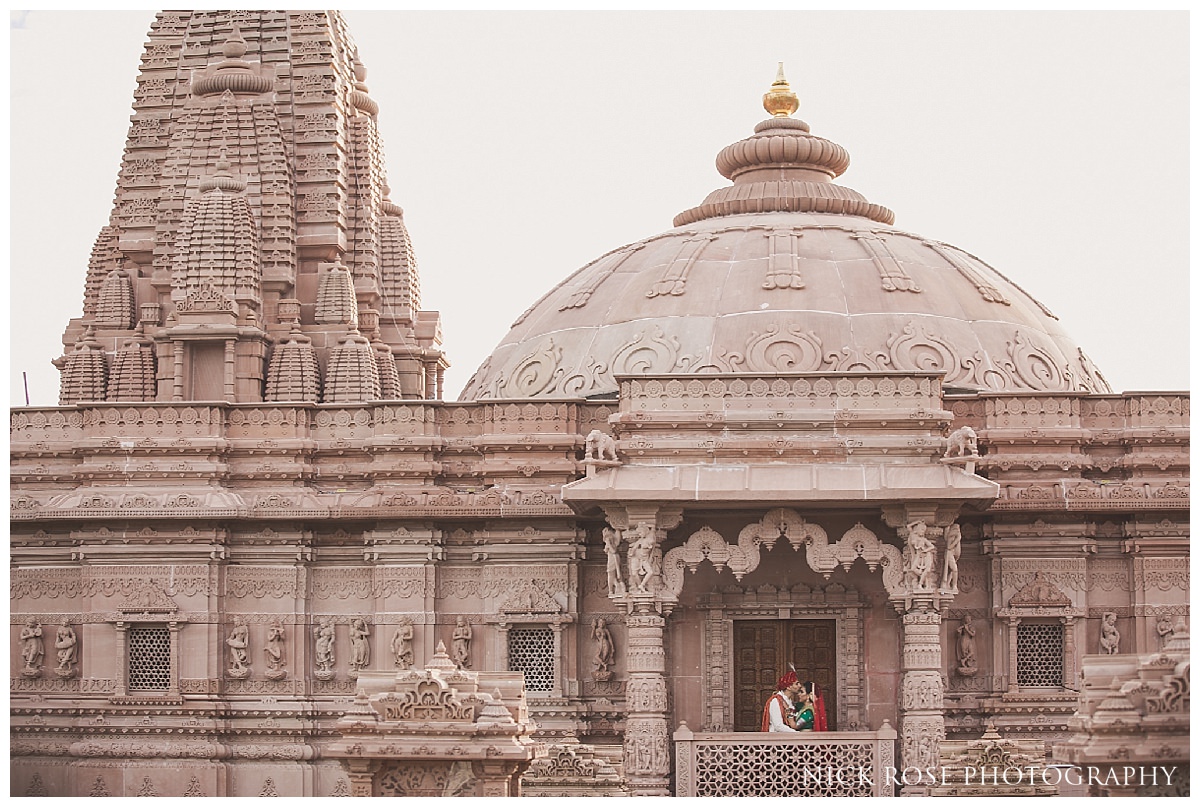 Hindu bride and groom wedding photography portrait in the Oshwal Centre temple in Potters Bar