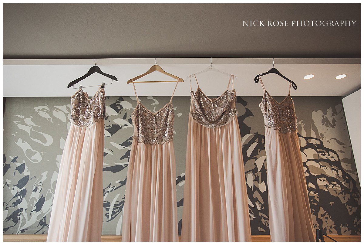  Bridesmaids dresses hanging up before a Dubrovnik Palace Wedding in Croatia 