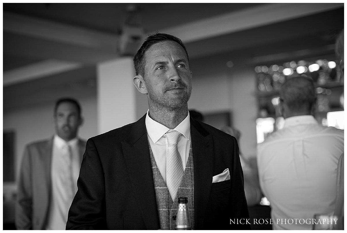  Groom getting ready for a destination wedding at Dubrovnik Palace hotel in Croatia 