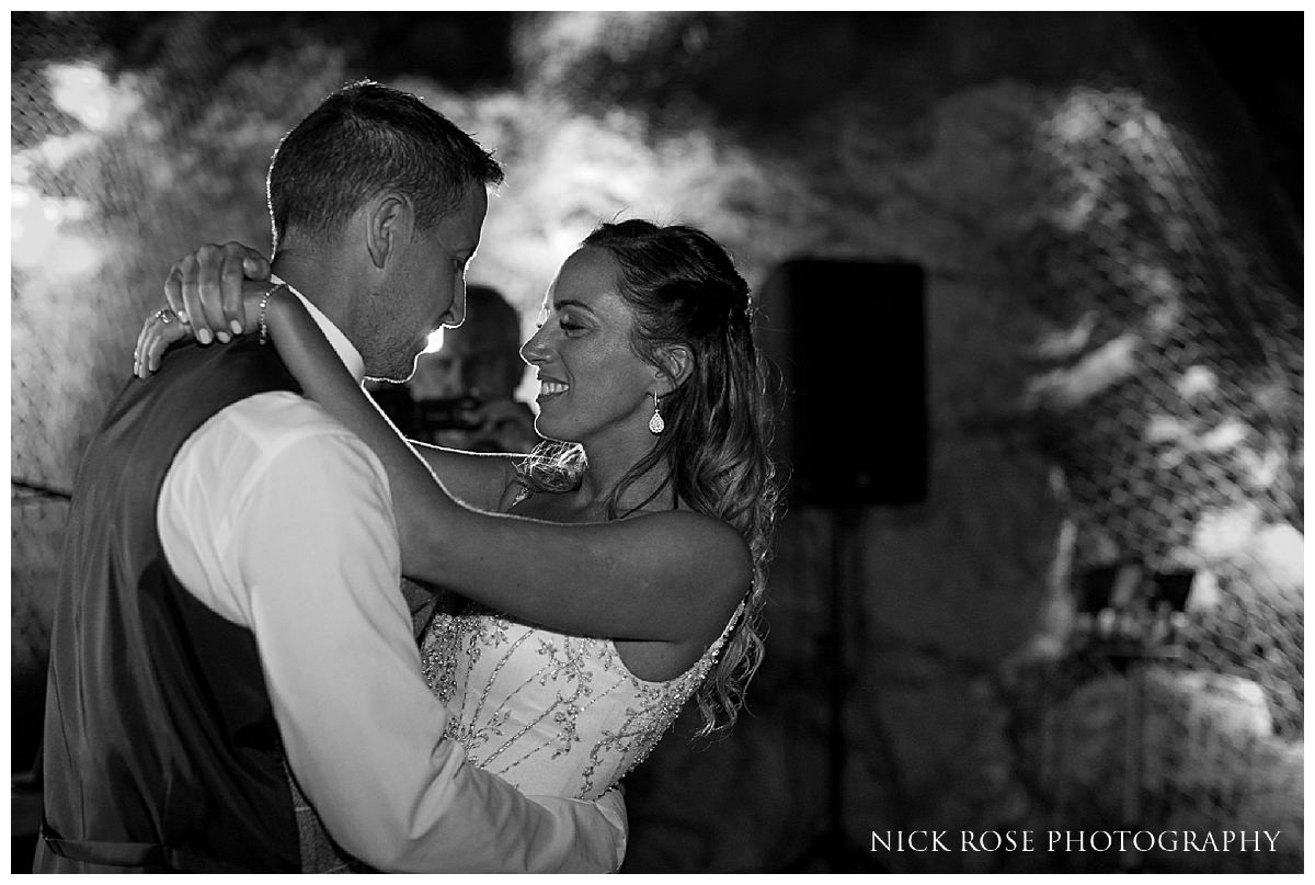  Wedding couple outdoor first dance by the pool following a wedding reception at Dubrovnik Palace in Croatia 
