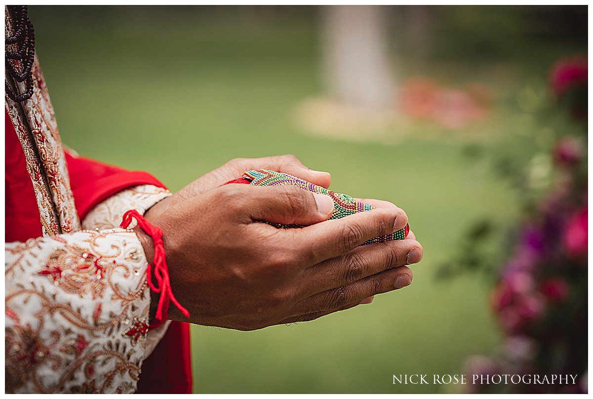  Grooms hands before a Hindu wedding in Portugal 
