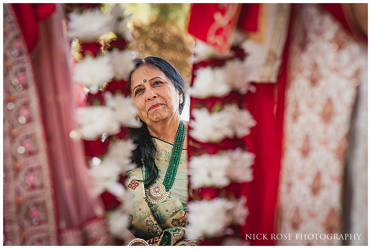  Mother watching a Hindu wedding ceremony in Portugal 