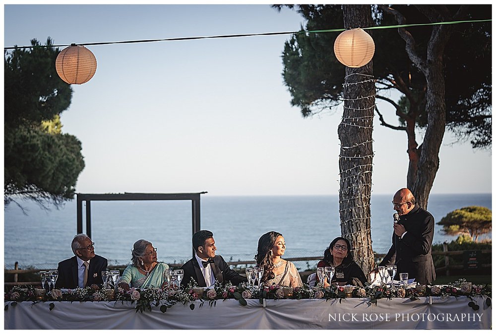  Indian wedding reception at the Pine Cliff resort hotel in Portugal photographed by destination wedding Photographer Nick Rose 