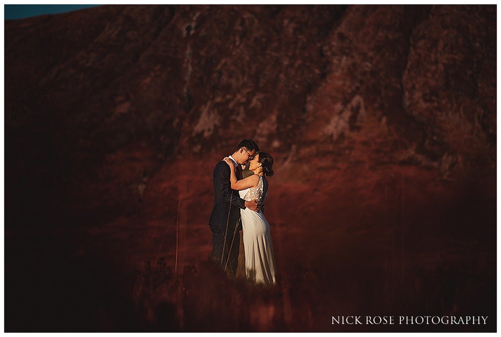  A couple embracing in front of the stunning backdrop of the Scottish Highlands 