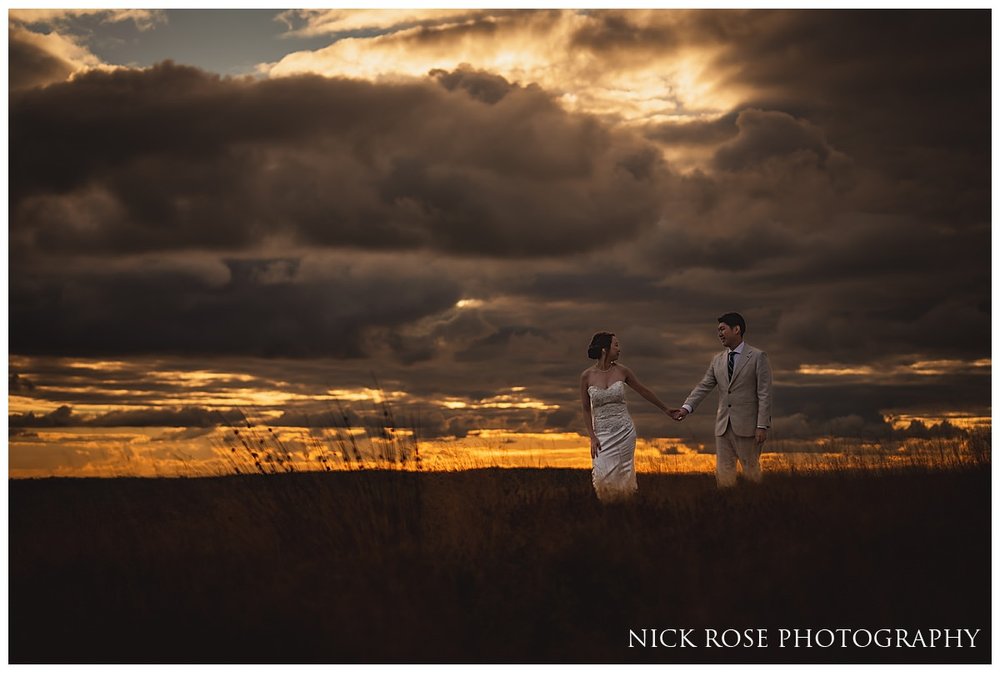  An unforgettable sunset in the scenic Peak District, highlighting the area's rugged charm and the couple's love story 