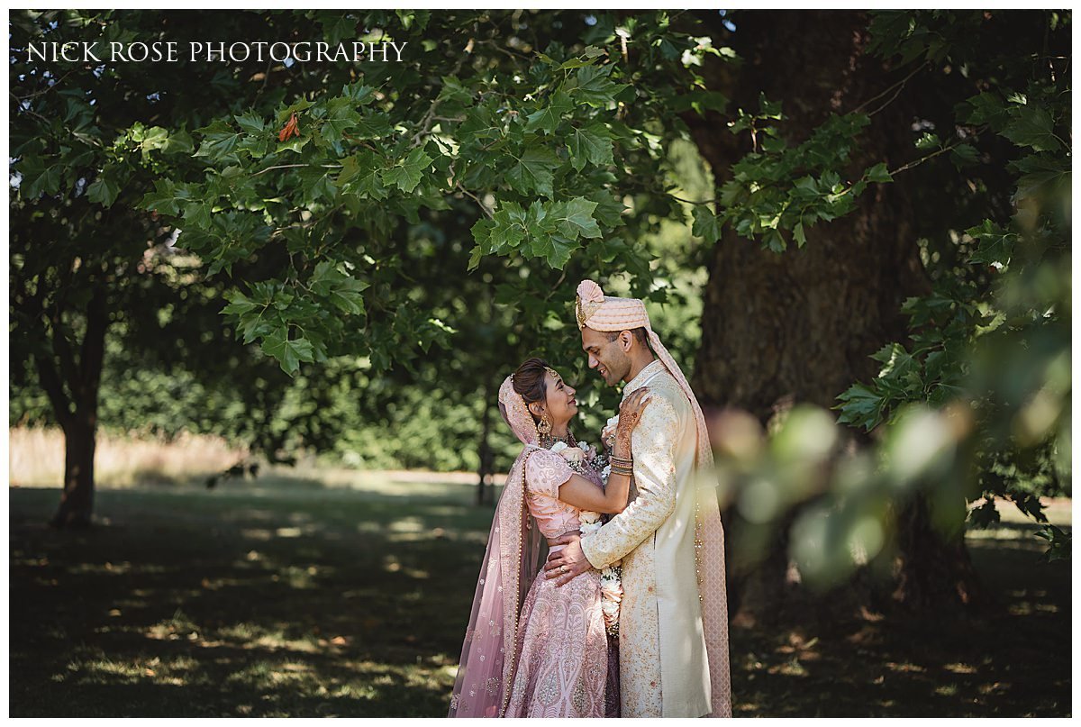  Bride and groom wedding portrait for a Hindu Wedding at Hampton Court Palace 