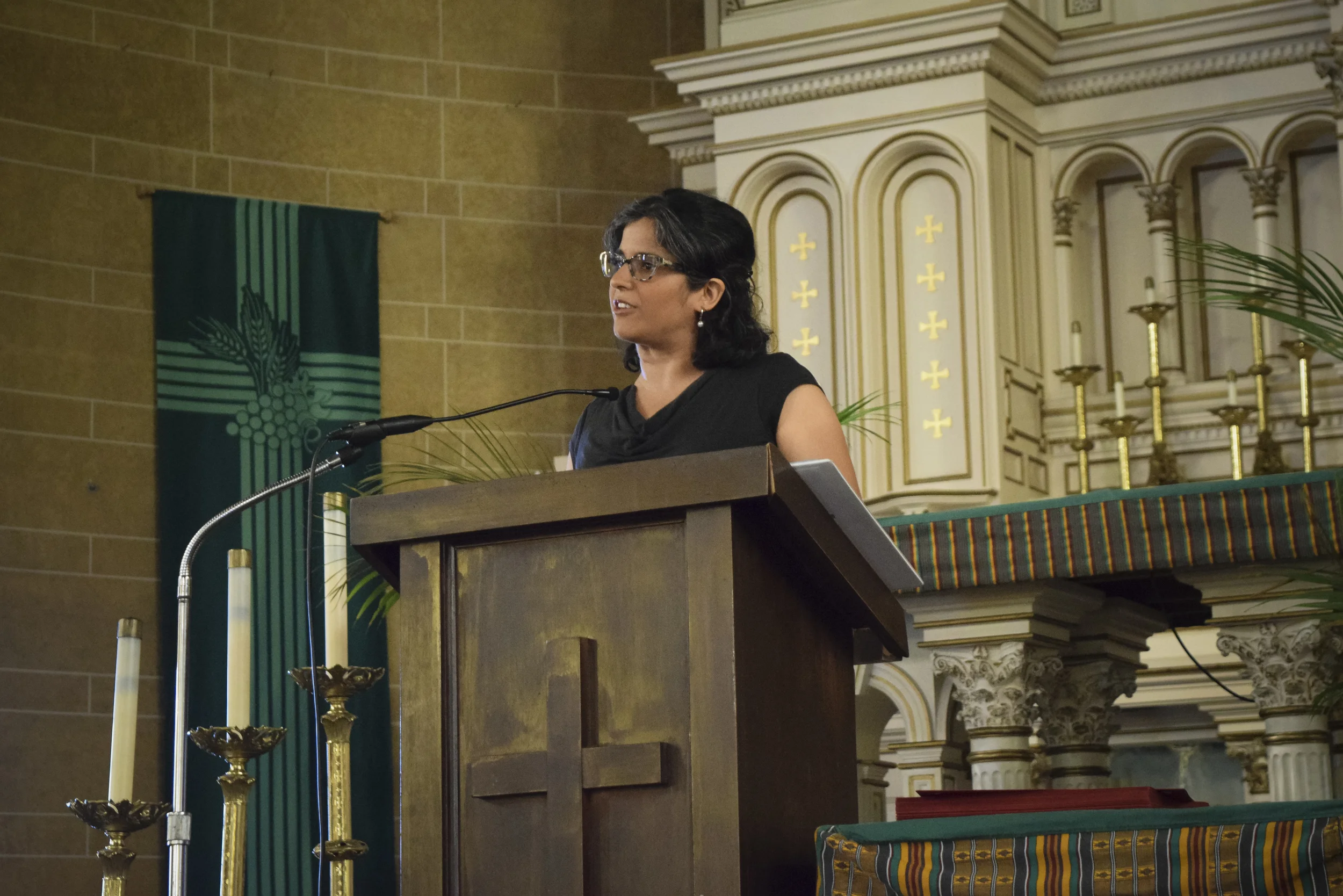 Ms. Nisha addresses the graduates, families, and friends.