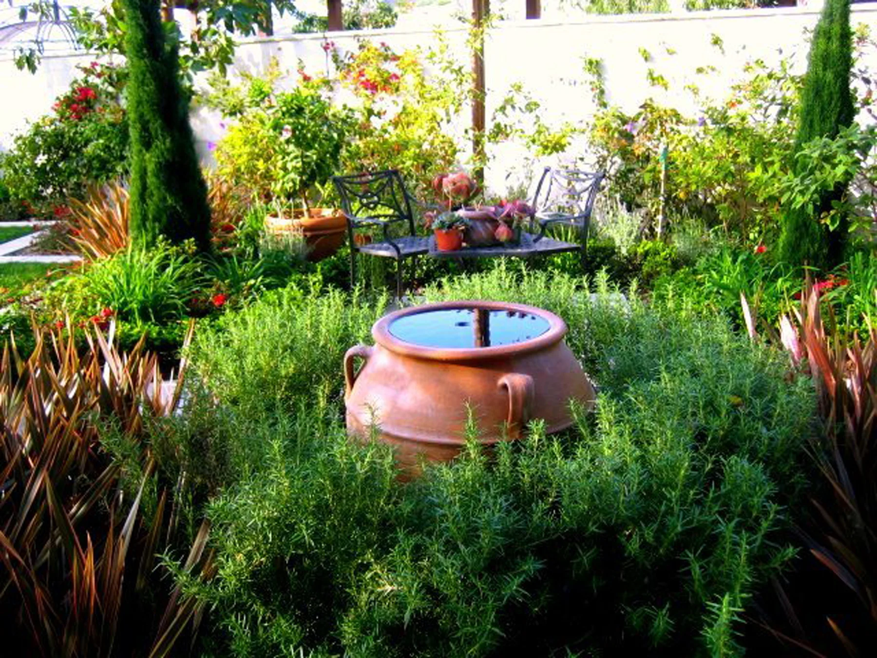 Sargisian Residence - Urn fountain in planting.jpg