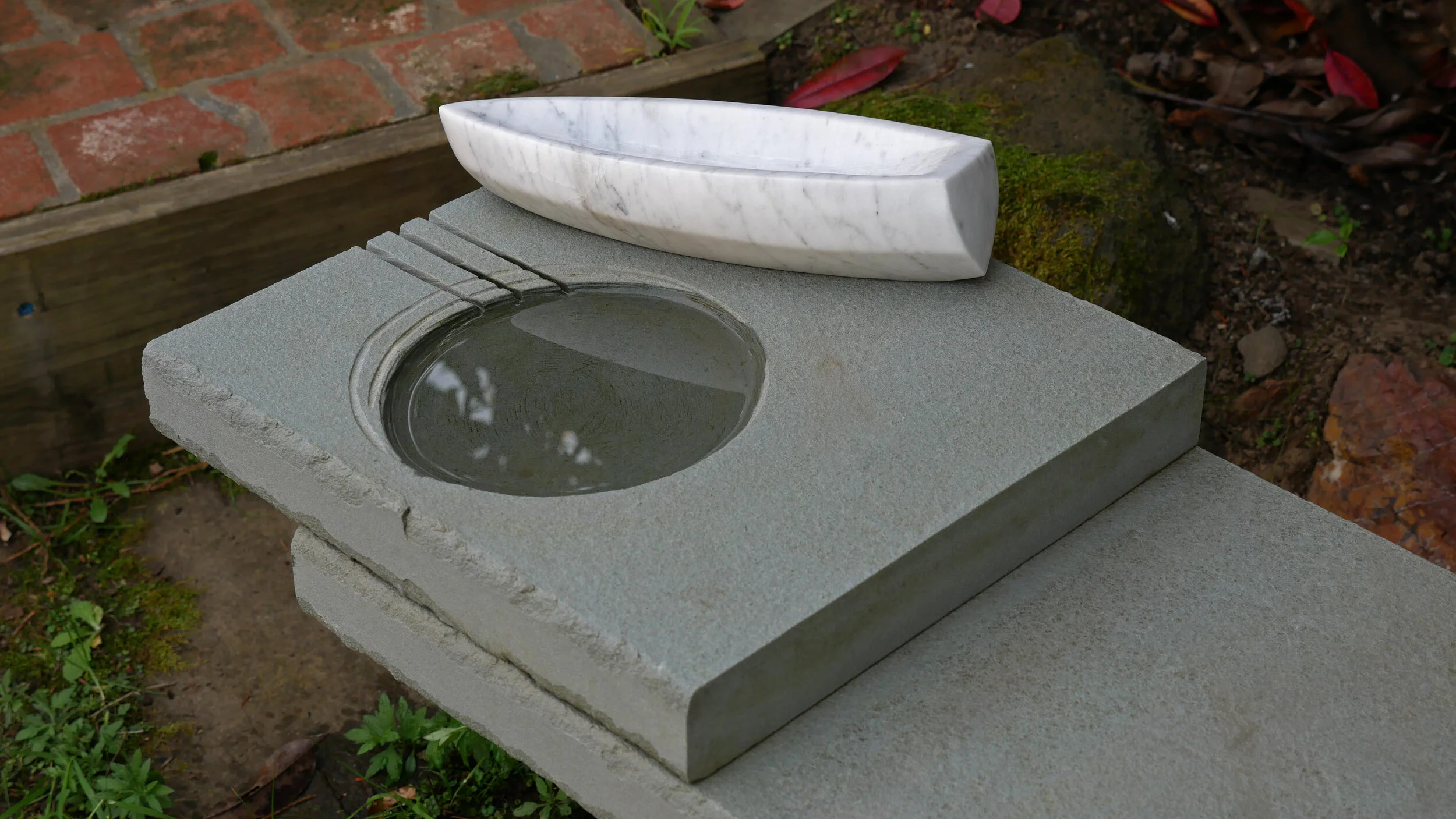 Brewster Boat with Water and Bench.jpg