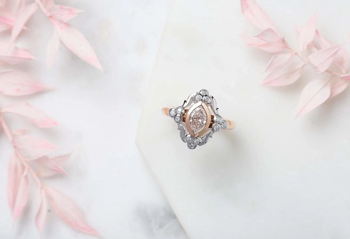 From the &ldquo;Garden Of Delights&rdquo; design collection, this one off &ldquo;Marquise Garden&rdquo; ring has fallen straight from a fairytale. A solid rose gold bezel holds the rare centre marquise diamond, whilst white gold and white diamonds blossom around the border. ✨ size K 1/2 but can be resized for your perfect fit. Made in Australia using Australian gold. GIA certified Diamond. Available through our boutique or online, tap to shop! ✨
.
.
#marquisediamond #marquisediamondring #rosegoldring #designerjewellery #rarerings #sydneyengagementrings #cocktailrings #diamondrings