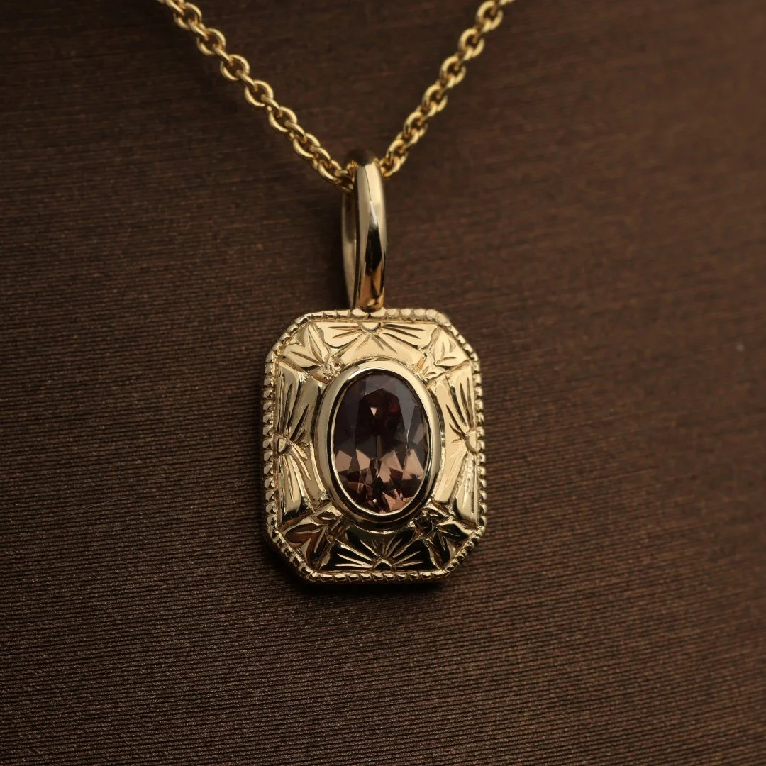 Hand engraved yellow gold pendant