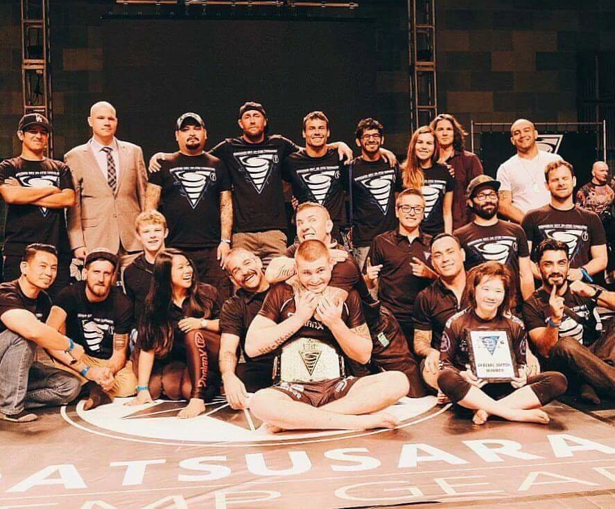 The EBI 6 staff plus Gordon Ryan the champ