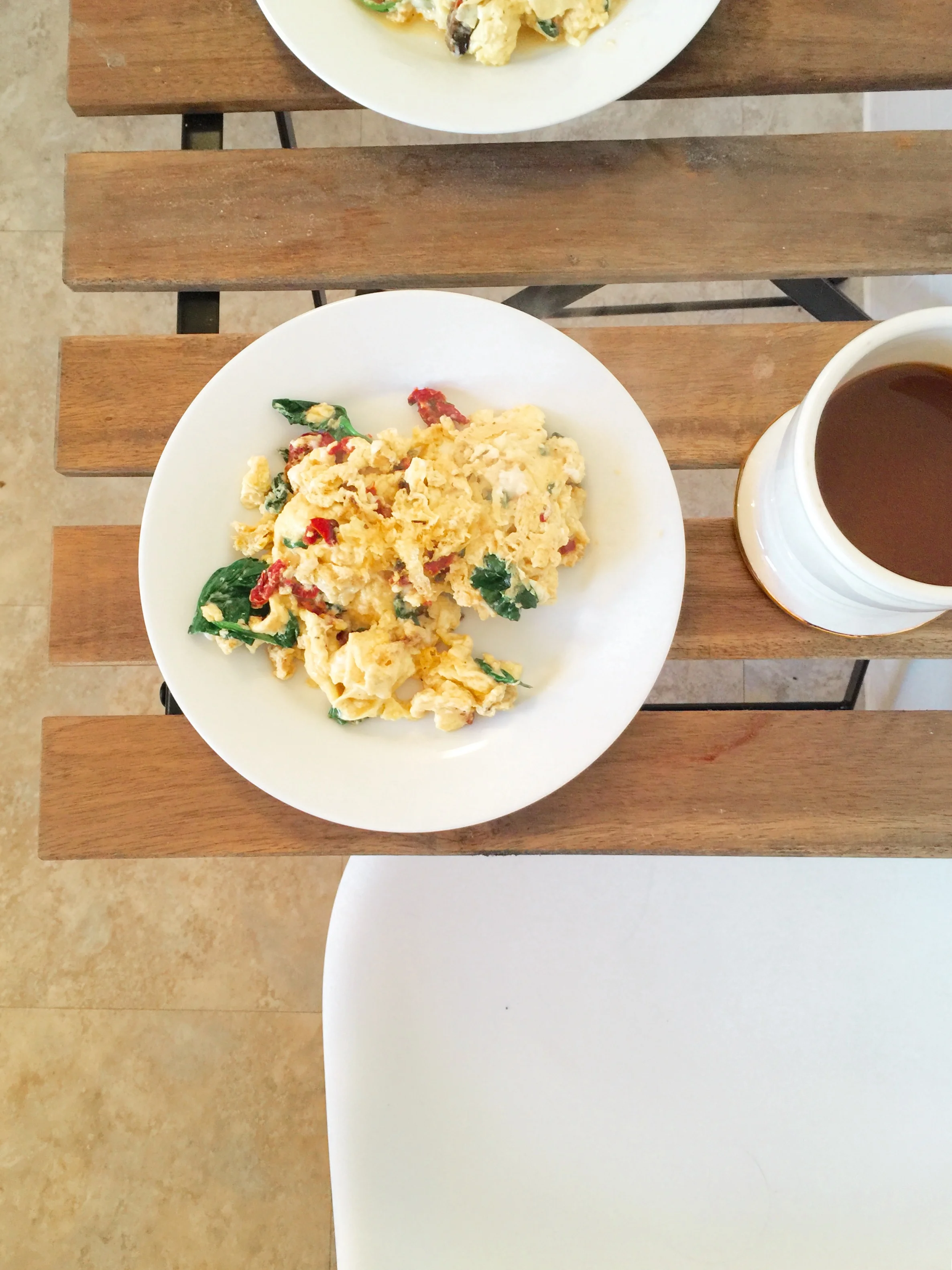 Spinach and sundried tomatoes with eggs