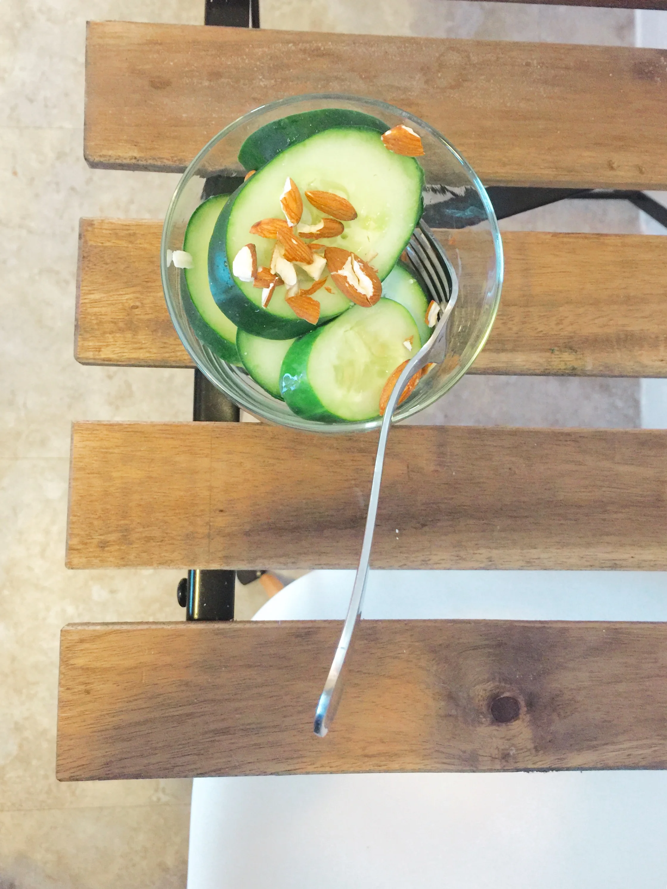 Quick pickled cucumbers with a few crushed almonds