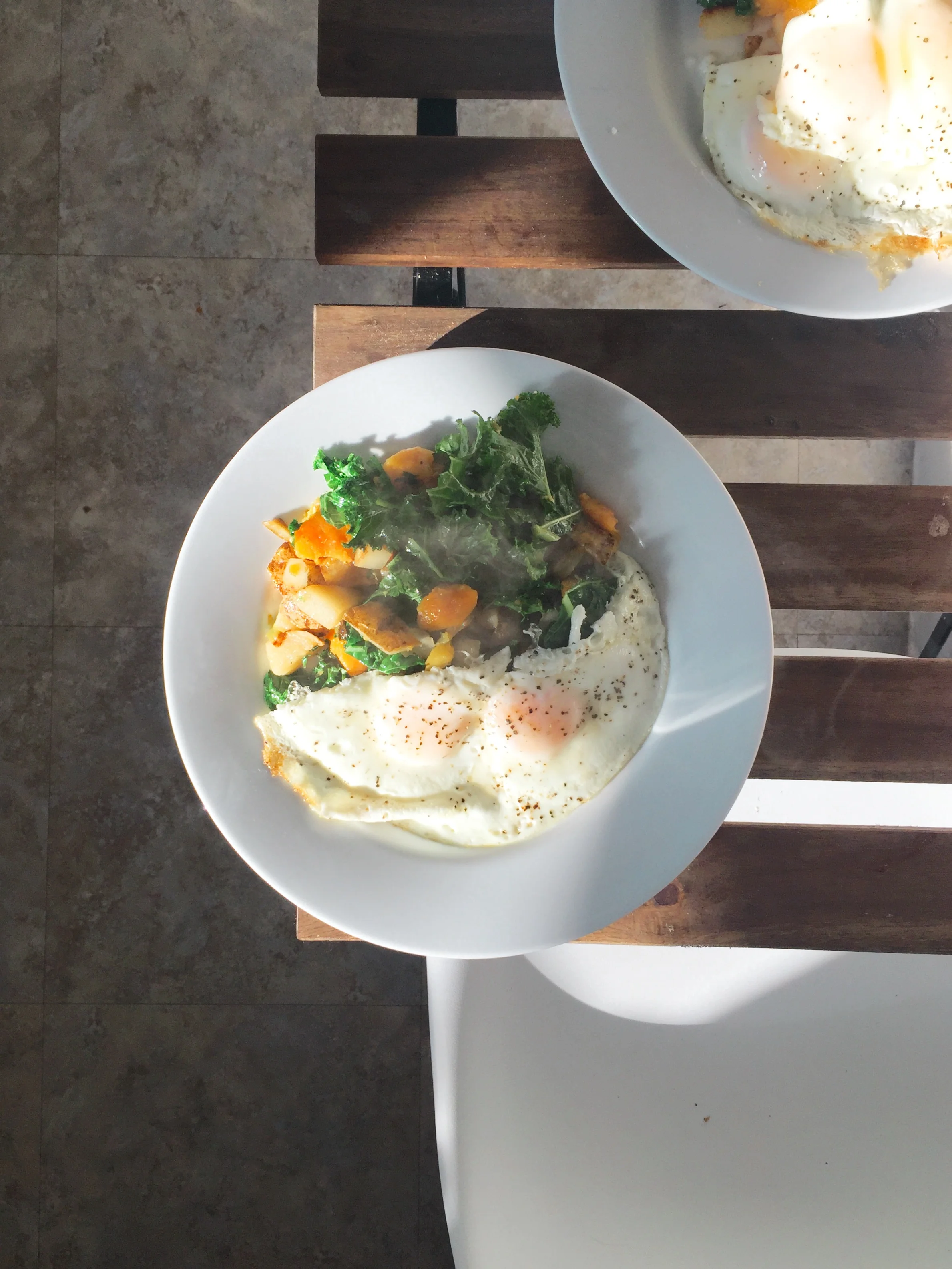 Eggs with butternut squash, kale, and potato hash