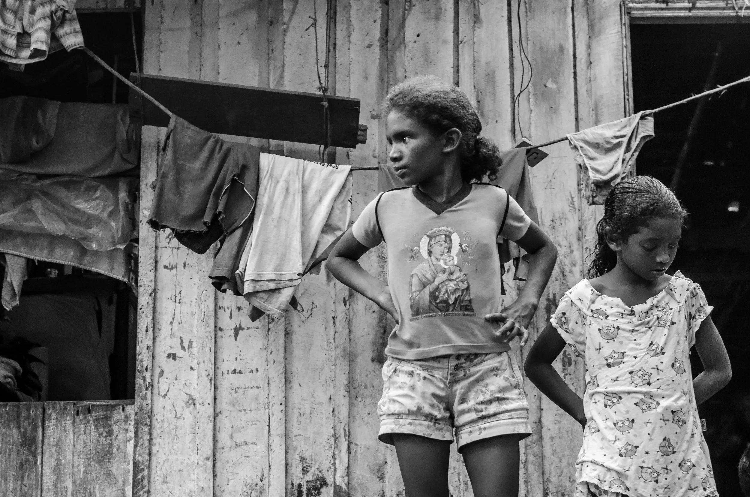 Little girls outside their grandmother's home in Arapapuzinho, in the Amazon.