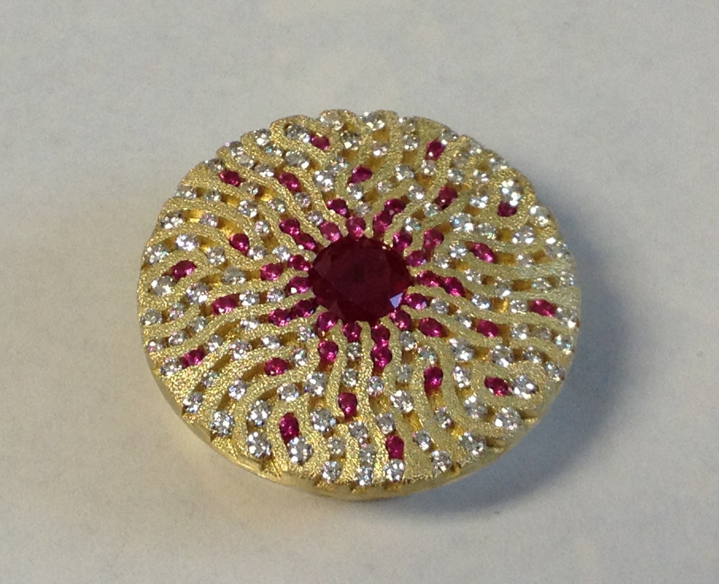 18k Yellow Gold Slide Pendant for a 9.00mm round Burmese Ruby, accented by round full cut 1.30 mm ruby and diamond melee. Private Collection 