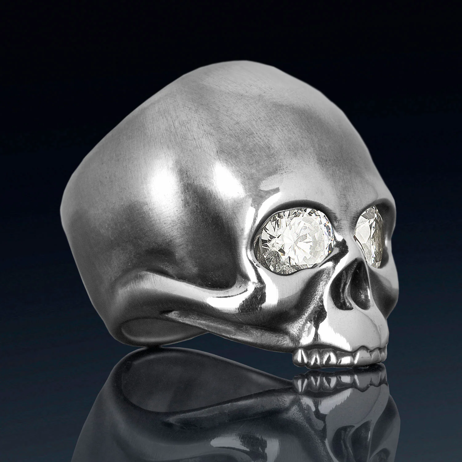 KEITH WITH DIAMONDS – An exact re-creation of Keith Richards skull with faux diamonds or gemstones.  Rock and roll’s best handmade skull rings and silver skull jewelry.
