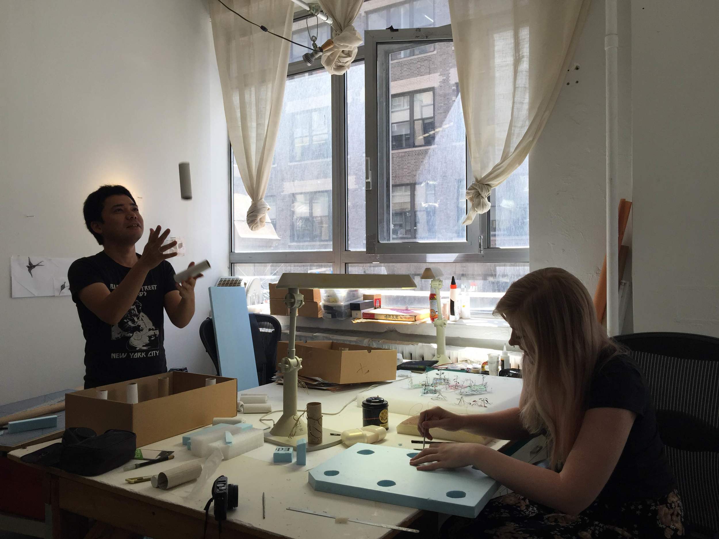 Rachel Chladu working in Yuken Teruya's studio