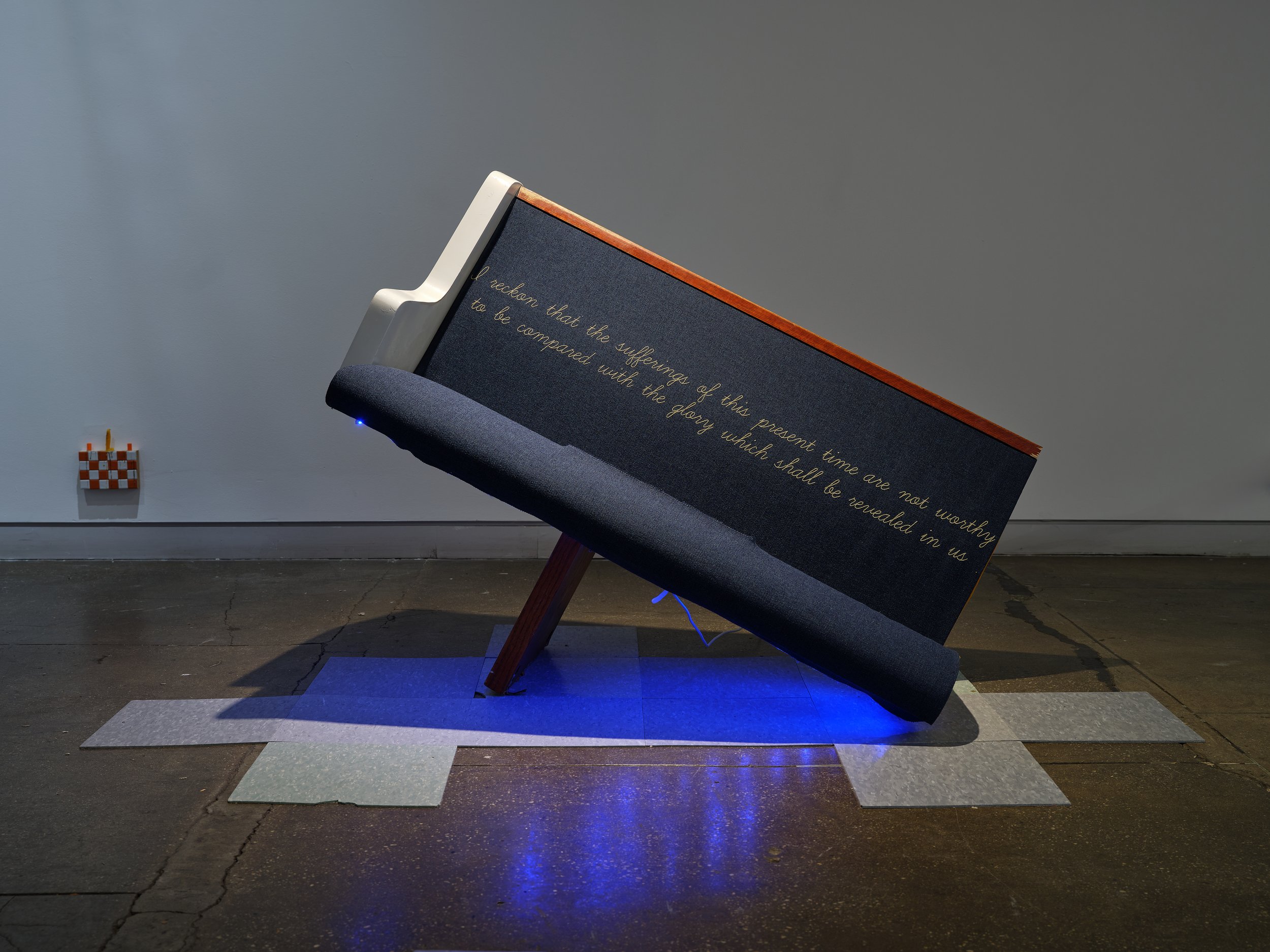 DaeQuan Alexander Collier, NOTHING TO LOSE , 2025, Wood, vinyl, standard-definition video (color, sound;, 5:31 min.), LCD monitor, glass, 32 x 48 x 18 inches