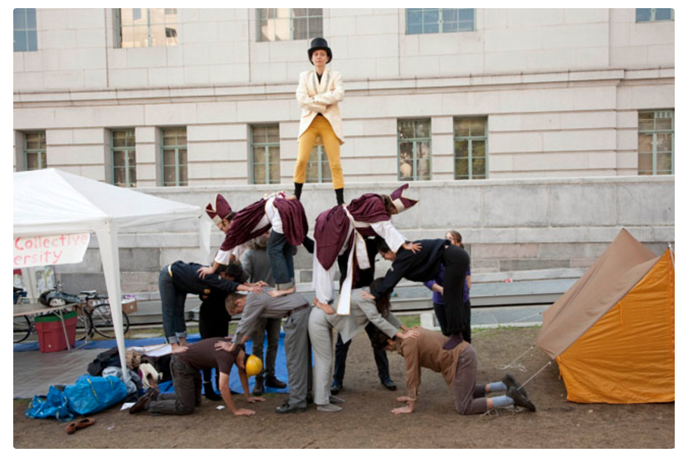 Robby Herbst, Pyramid of Capitalist System, 2011. Performance at LA City Hall during Occupation 10/11. Photo: Lisa Anne Auerbach